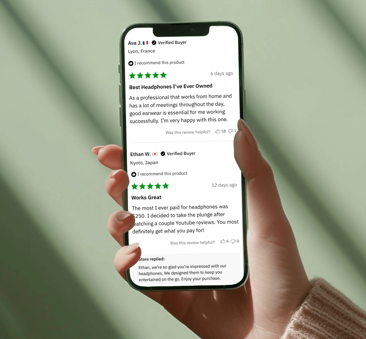 A woman hand holding a mobile phone, displaying a product review powered by Superdesk